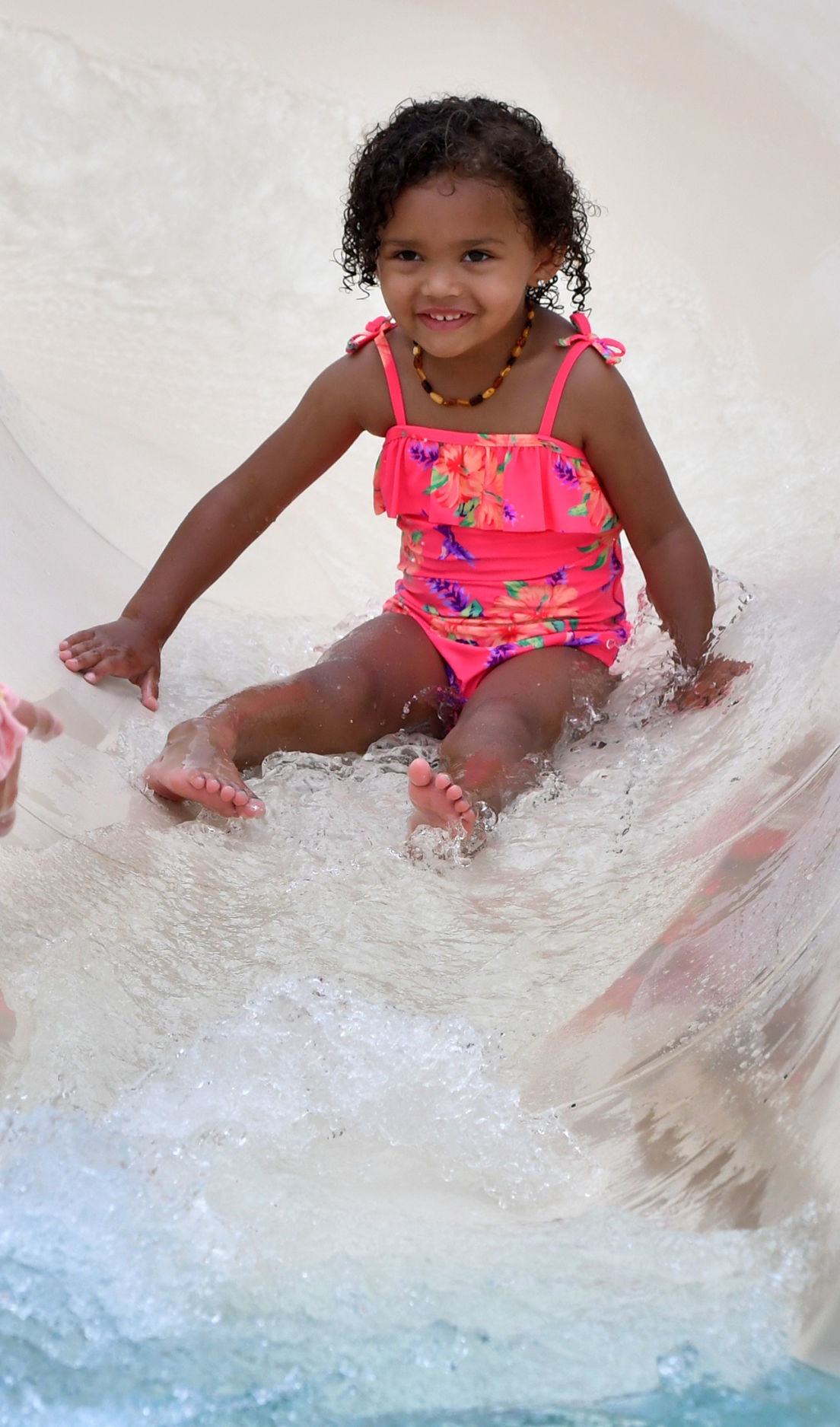 People cooling off on a hot day at Splash Landing in Bettendorf.